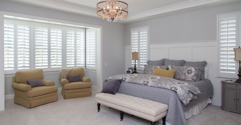 Plantation shutters in Bluff City bedroom.